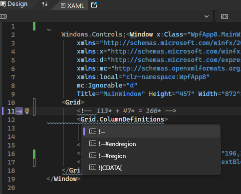 IntelliSense に #region オプションが表示されている XAML コード エディターのスクリーンショット。