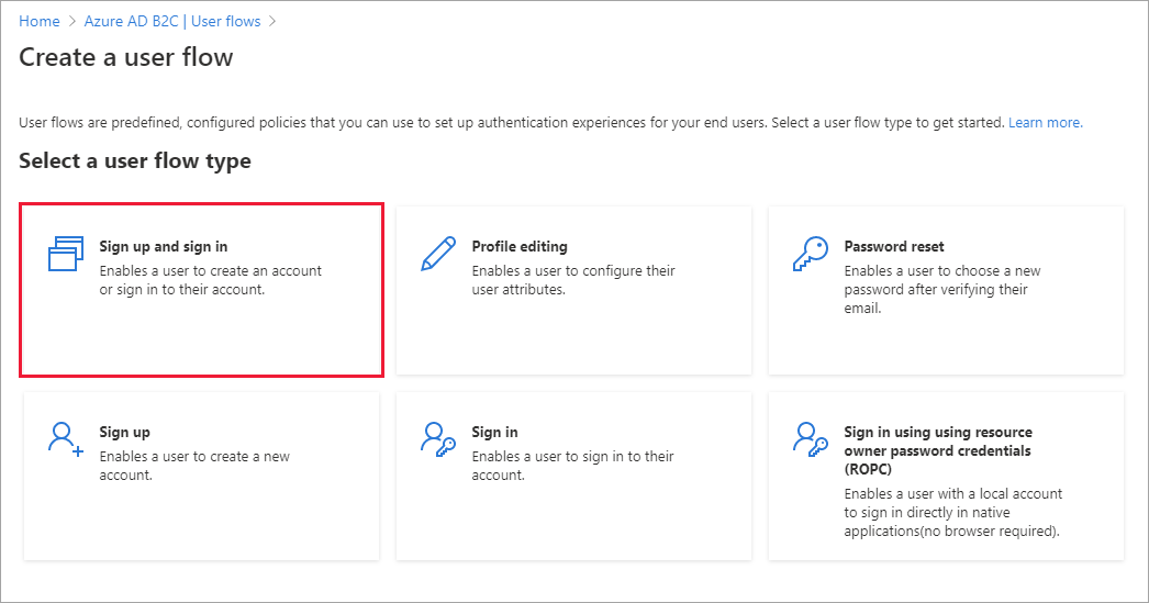 Captura de ecrã da página Selecionar um fluxo de utilizador do portal Azure com o fluxo de Inscrição e início de sessão realçado.