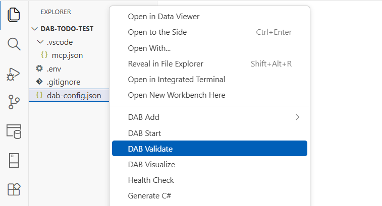 Captura de ecrã do comando DAB Validate a correr e a reportar a saída de validação no Visual Studio Code.