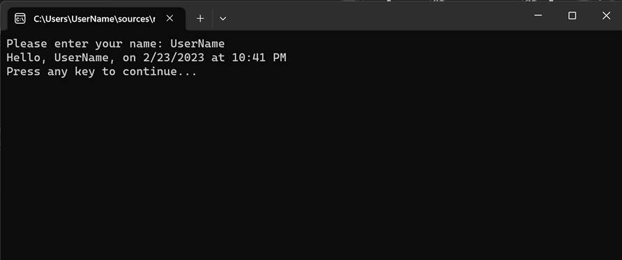 Captura de tela mostrando a janela do console de depuração com mensagens 'Digite seu nome', a data e hora e 'Pressione qualquer tecla para continuar'.
