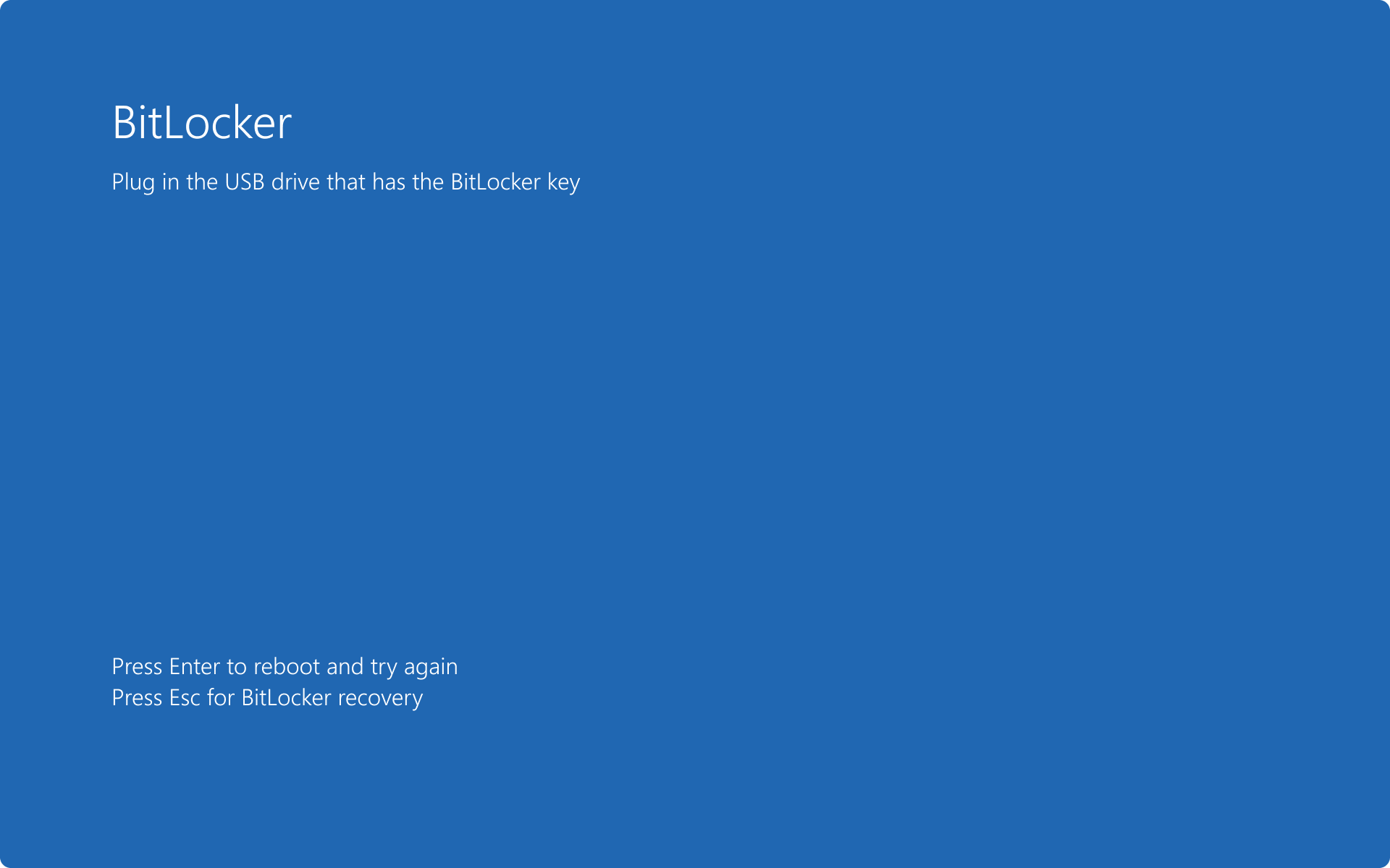 Captura de ecrã do ecrã de pré-arranque do BitLocker a pedir uma pen USB com a chave de arranque.