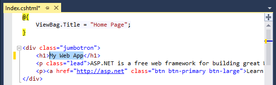 Skärmbild av Visual Studio, med ett ASP.NET-projekt som visas och H1-rubriken markerad.